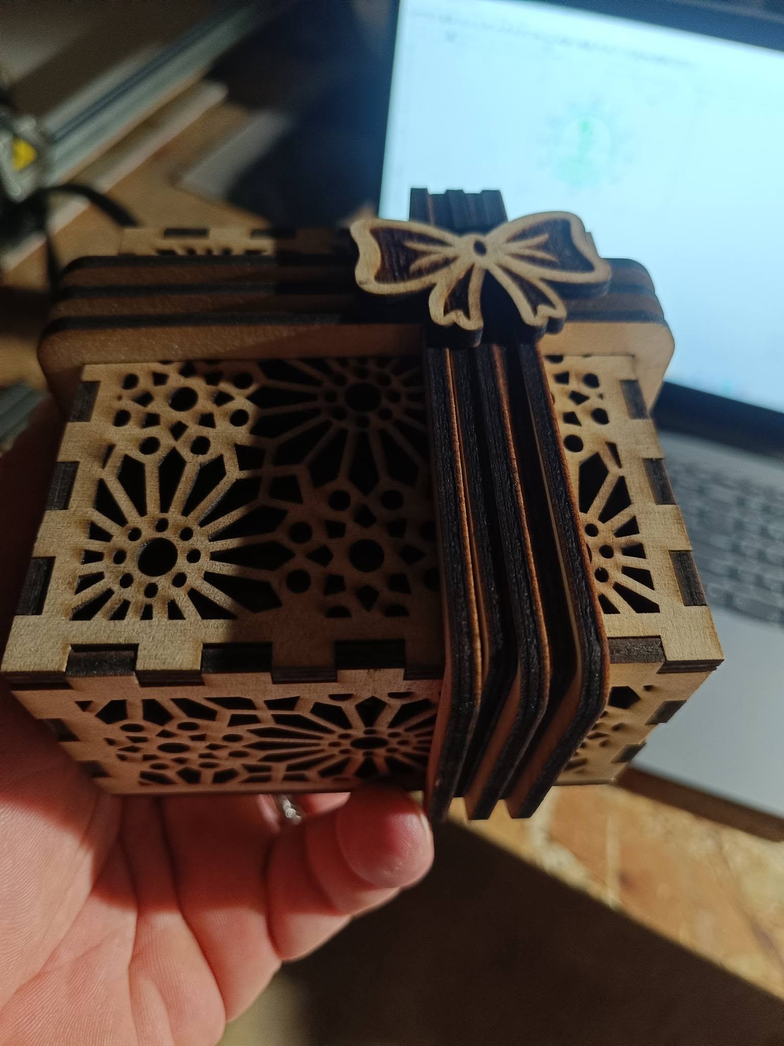 Gift Box DXF 3mm and 4mm Preview Laser cut wooden gift box with geometric pattern and bow